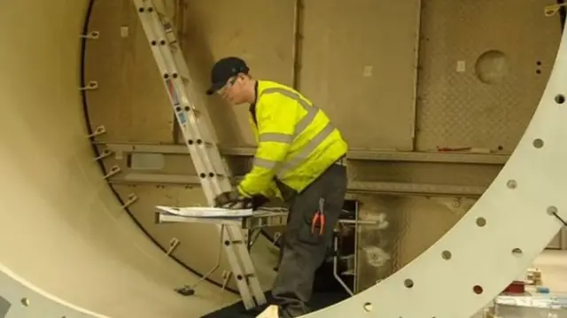 Engineer working in wind tower