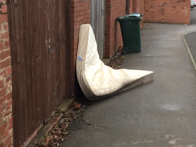 Mattress in street