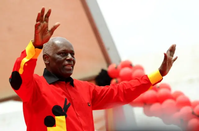 Angolan President Jose Eduardo dos Santos Angolan greets the crowd on August 29, 2012 during the final election campaign rally in Kilamba Kaixi on the outskirts of Luanda