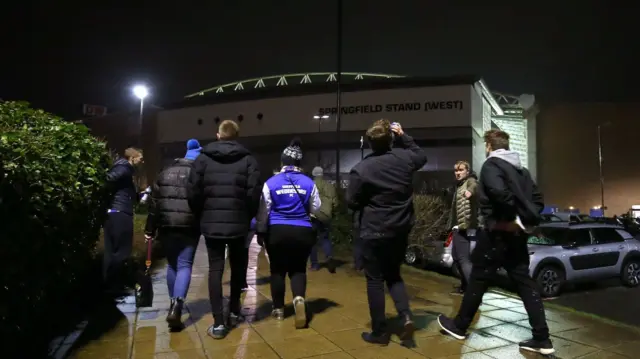 Fans walk to DW Stadium