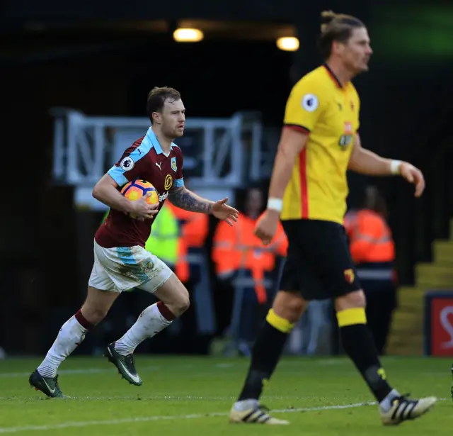 Ashley Barnes retrieves the ball after scoring