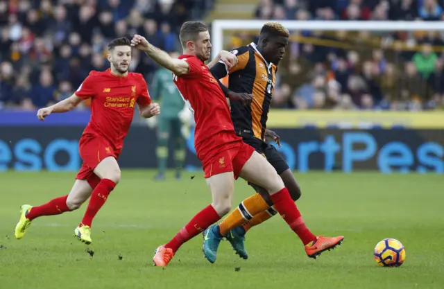 Alfred N"Diaye and Jordan Henderson