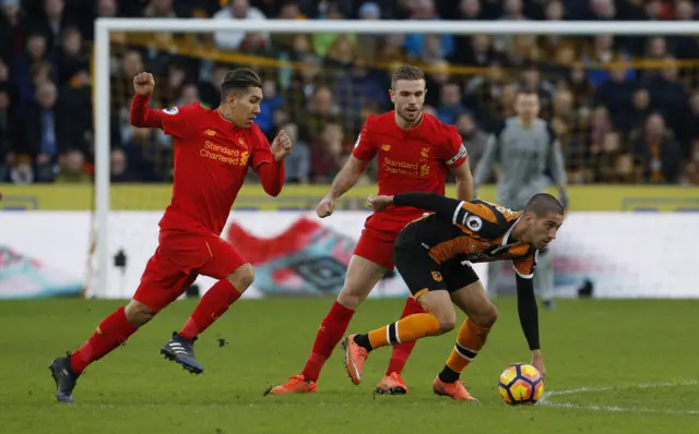 Roberto Firmino and Jordan Henderson