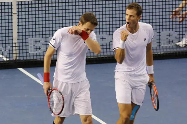 Vasek Pospisil with teammate Daniel Nestor