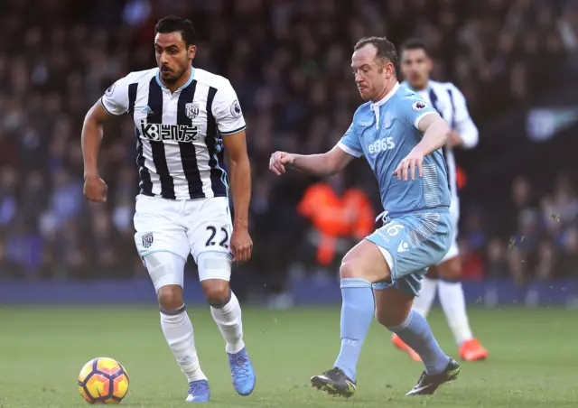 Nacer Chadli and Charlie Adam