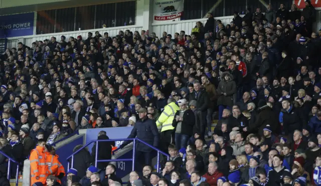 Fans leave the King Power Stadium