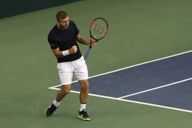 Dan Evans celebrates