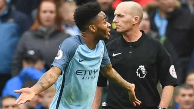 Raheem Sterling complains after being booked