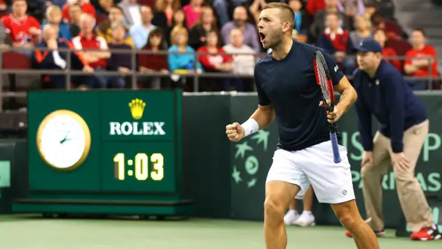 Dan Evans celebrates