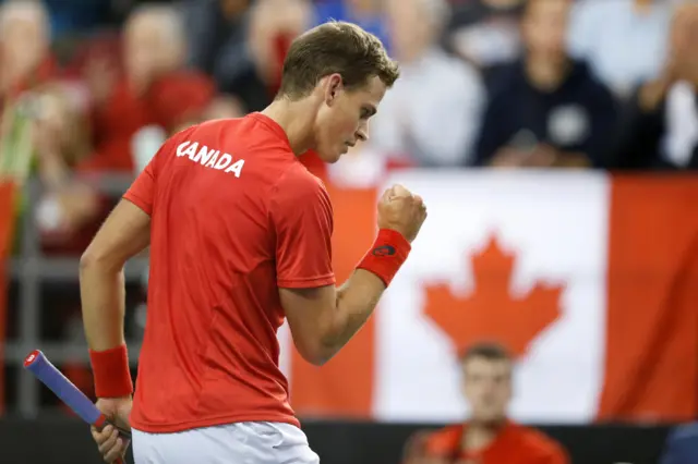 Vasek Pospisil celebrates