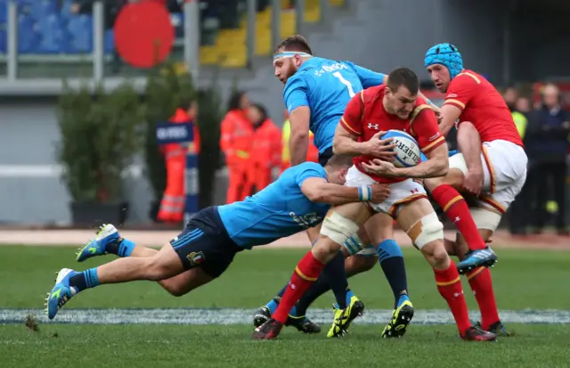 Sam Warburton in action with Italy"s Ornel Gega