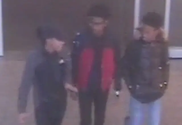 CCTV image of three people police wish to identify