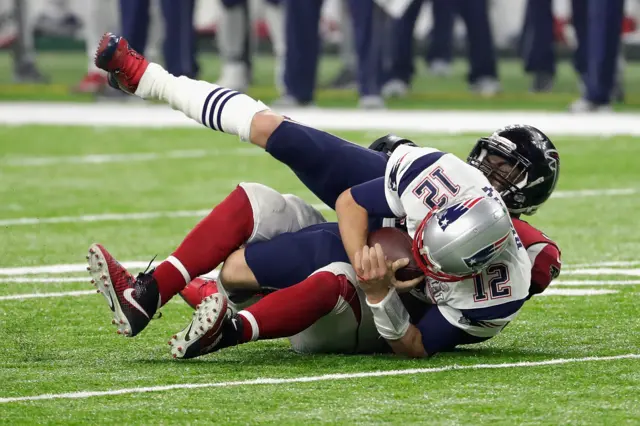 Tom Brady is sacked