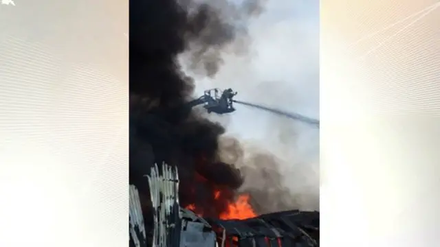Firefighter tackling Hanbury Plastics fire