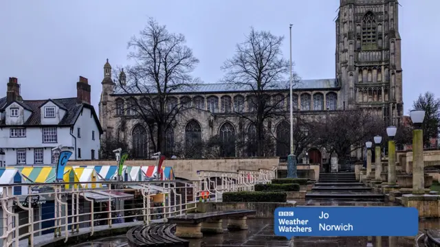 The rear of Norwich market place and St Peter Mancroft church, in the rain