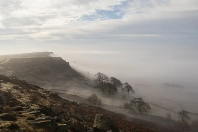 Swirling mists at Curbar Edge near Sheffield