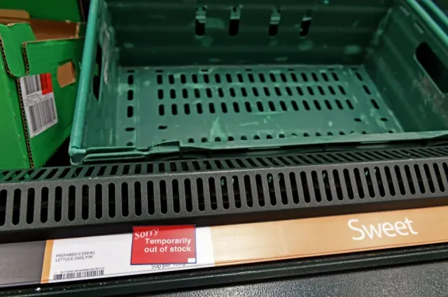 Empty iceberg lettuce shelves at a Tesco store in Kennington, London