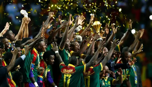 Cameroon's football team celebrating in Gabon