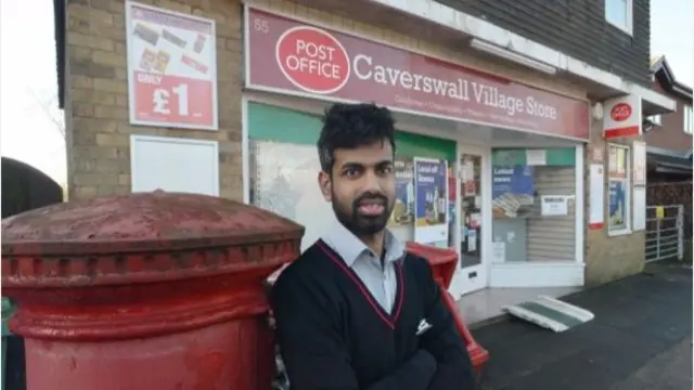Pratheesh Shanmuganathan outside his post office