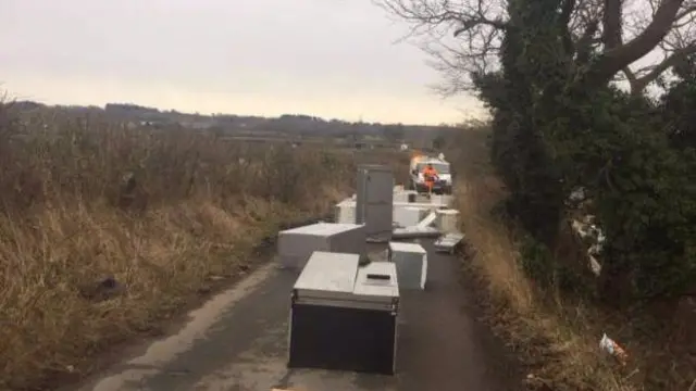 Fridges and freezers dumped on lane