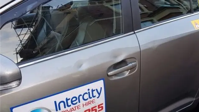 Dented taxi