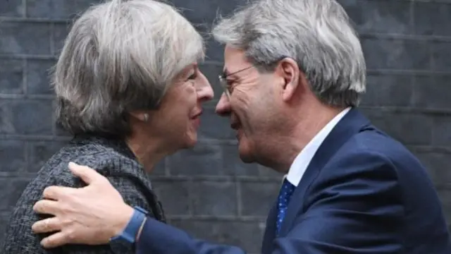 Theresa May and Paolo Gentiloni