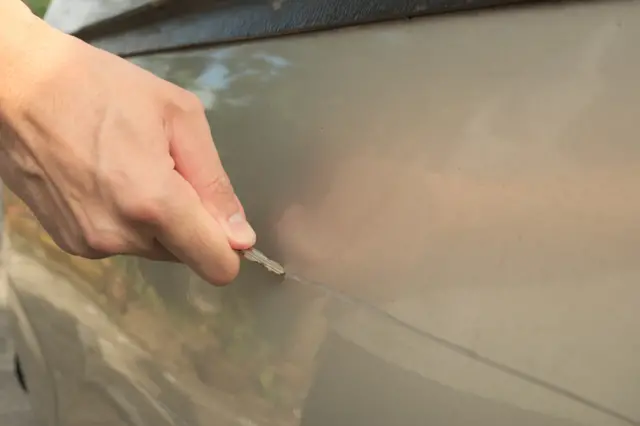 Car being scratched