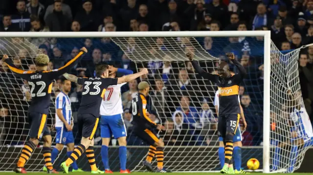 Mo Diame (right) celebrates his goal against Brighton