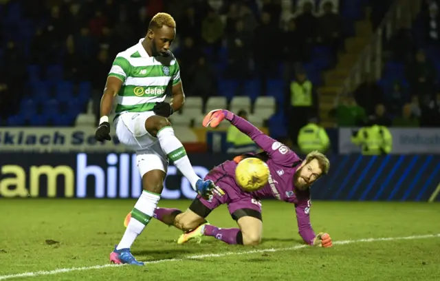 Moussa Dembele tucks the ball into an empty net