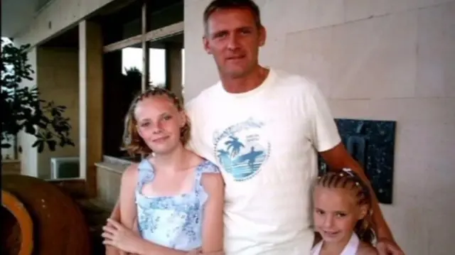 Wayne Evans and his children