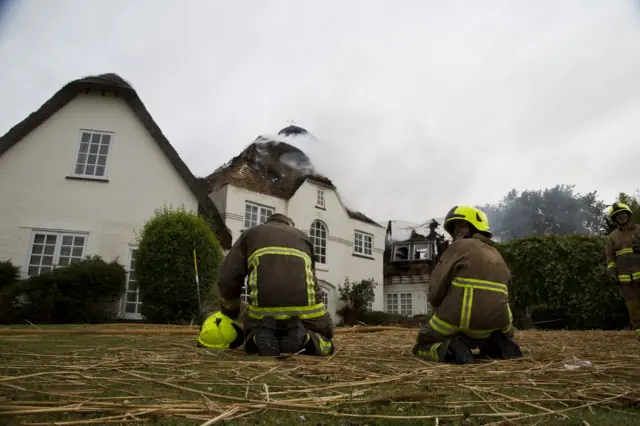 Firefighters at house fire