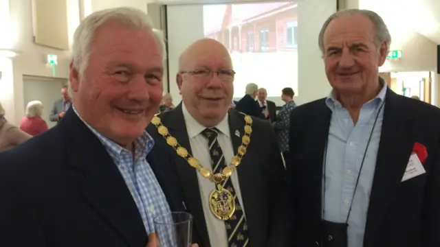 
          L-R: John Warham chairman of the village hall trust, David Whitby, borough mayor, Chris Burland from the cinema and satellite team at Thornham last night
        