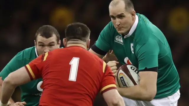 Devin Toner runs at Rob Evans