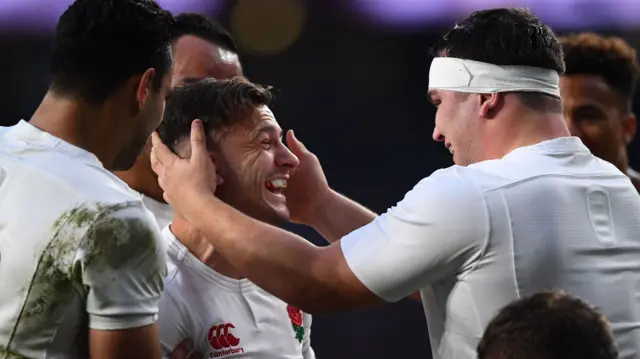 England's Danny Care celebrates scoring a try