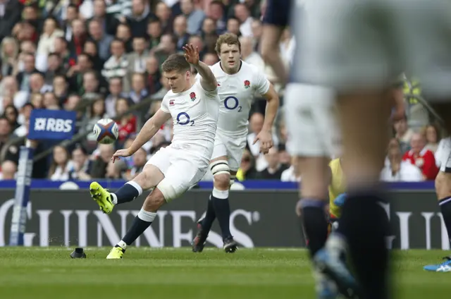 England's Farrell kicks a score