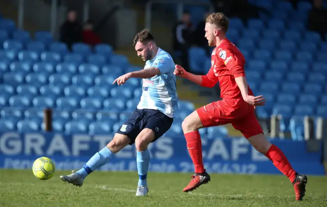 Johnny McMurray tries a shot for Ballymena