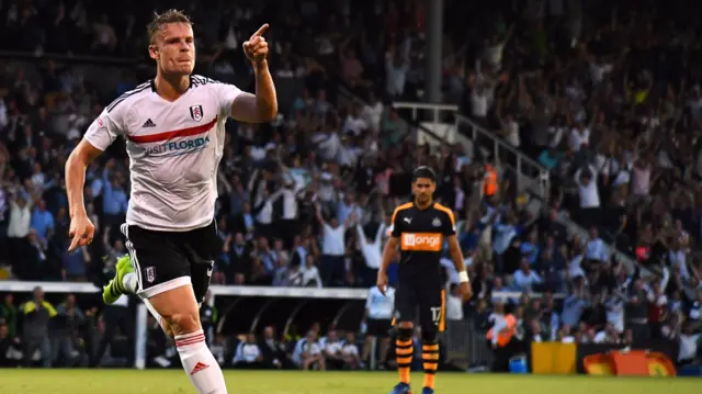 Matt Smith celebrates his goal against Newcastle