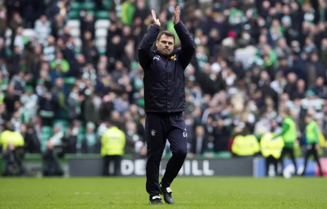 Graeme Murty applauds the Rangers fans