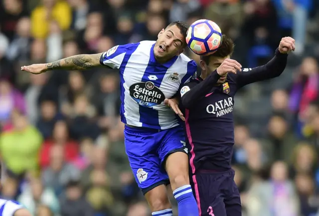 Joselu and Gerard Pique