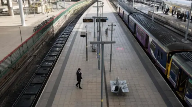 Single passenger at Manchester Victoria station