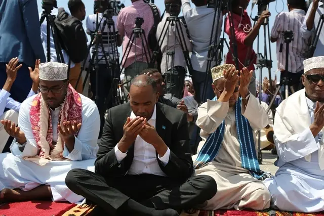 People gather to pray