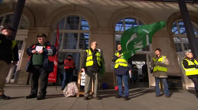 
          RMT Union members outside Hull's Paragon station during strike
        