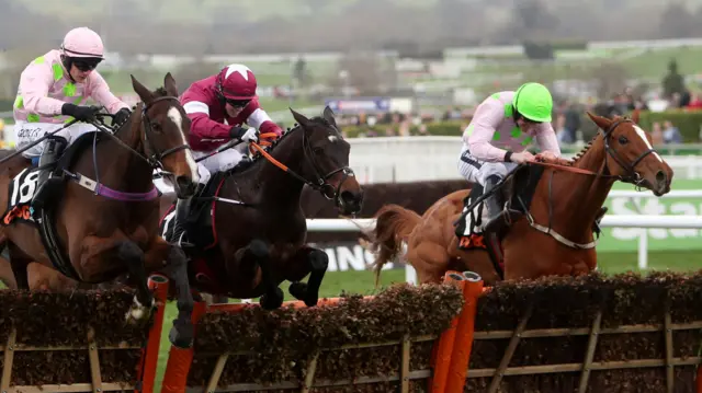 
          Jockey Paul Townend on board Vroum Vroom Mag, Bryan Cooper on board Apple"s Jade, and Ruby Walsh on board Limini during Champion Day of the 2017 Cheltenham Festival
        