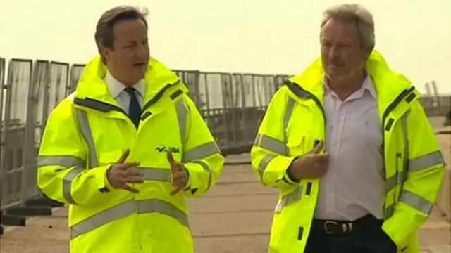 David Cameron walking with Giles Watling