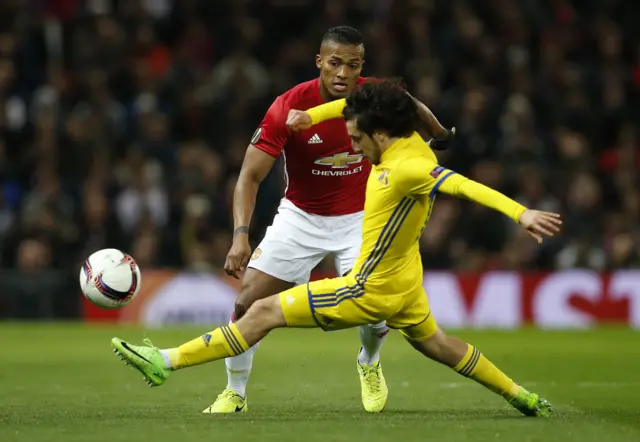 
          Manchester United"s Antonio Valencia in action with FC Rostov"s Khoren Bayramyan
        