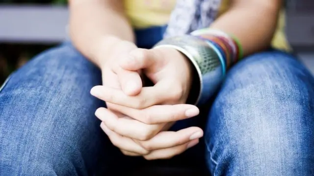 A young person's hands