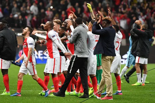 Monaco players celebrate