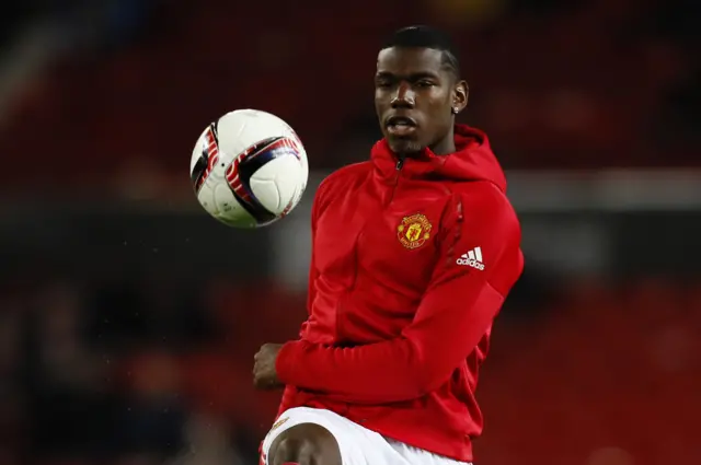 Pogba warms up