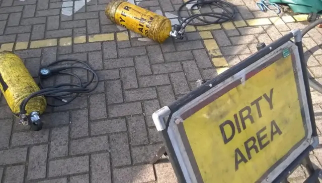 Practice canisters containing hazardous material