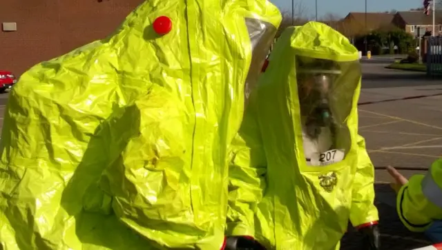 South Yorkshire firefighters wearing protective suits